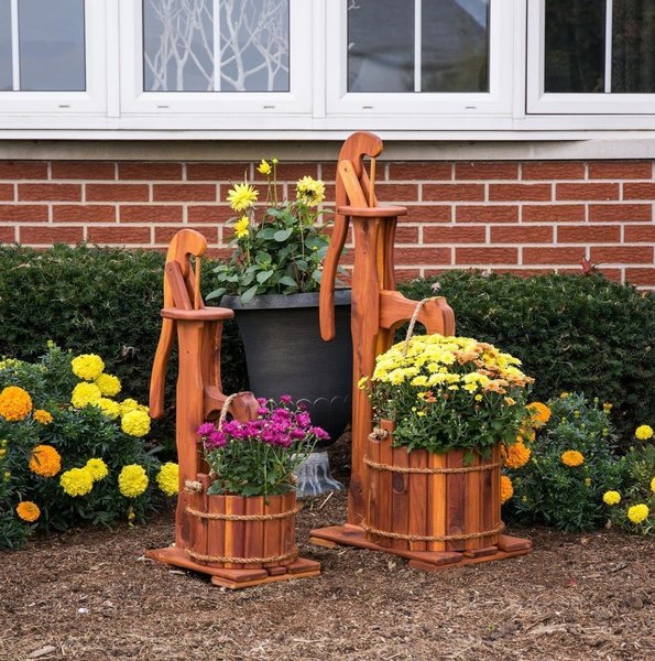 Cedar Wooden Buckets with colorful flowers placed in a backyard 