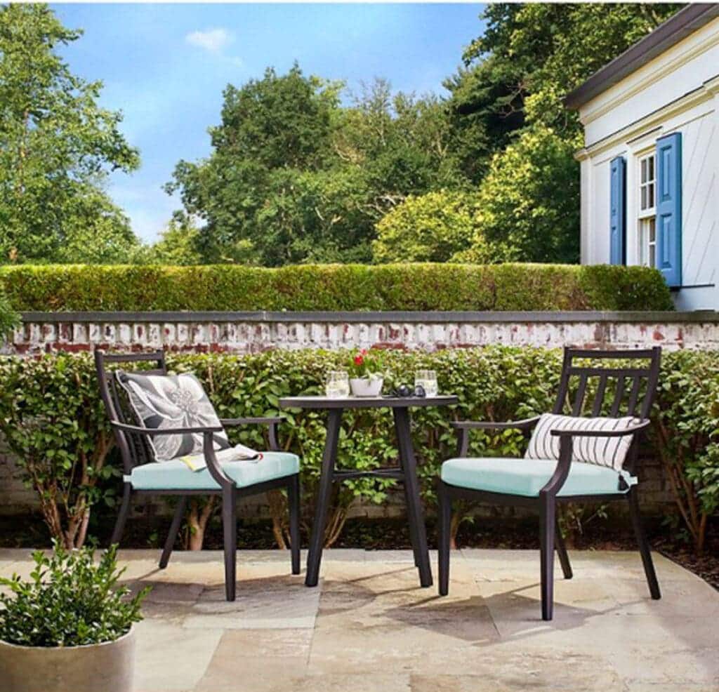 A view of an outdoor seating space in a garden